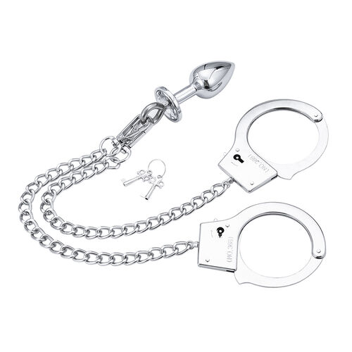 Menotte avec chaine et plug anal